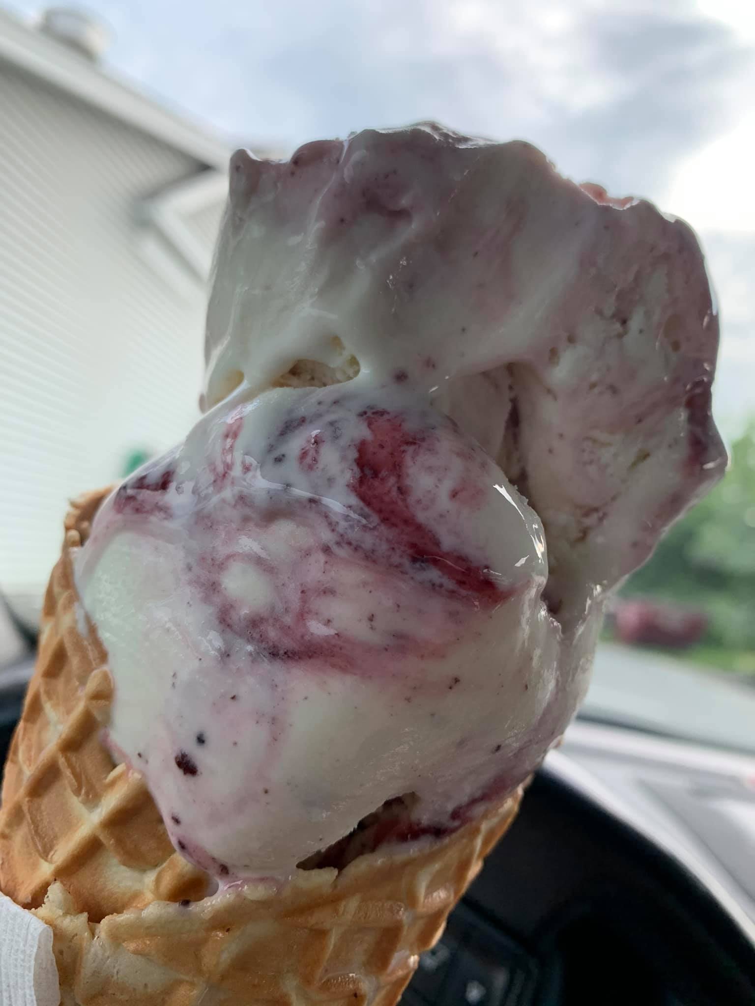 Raspberry swirl ice cream in a homemade waffle cone at Appleview